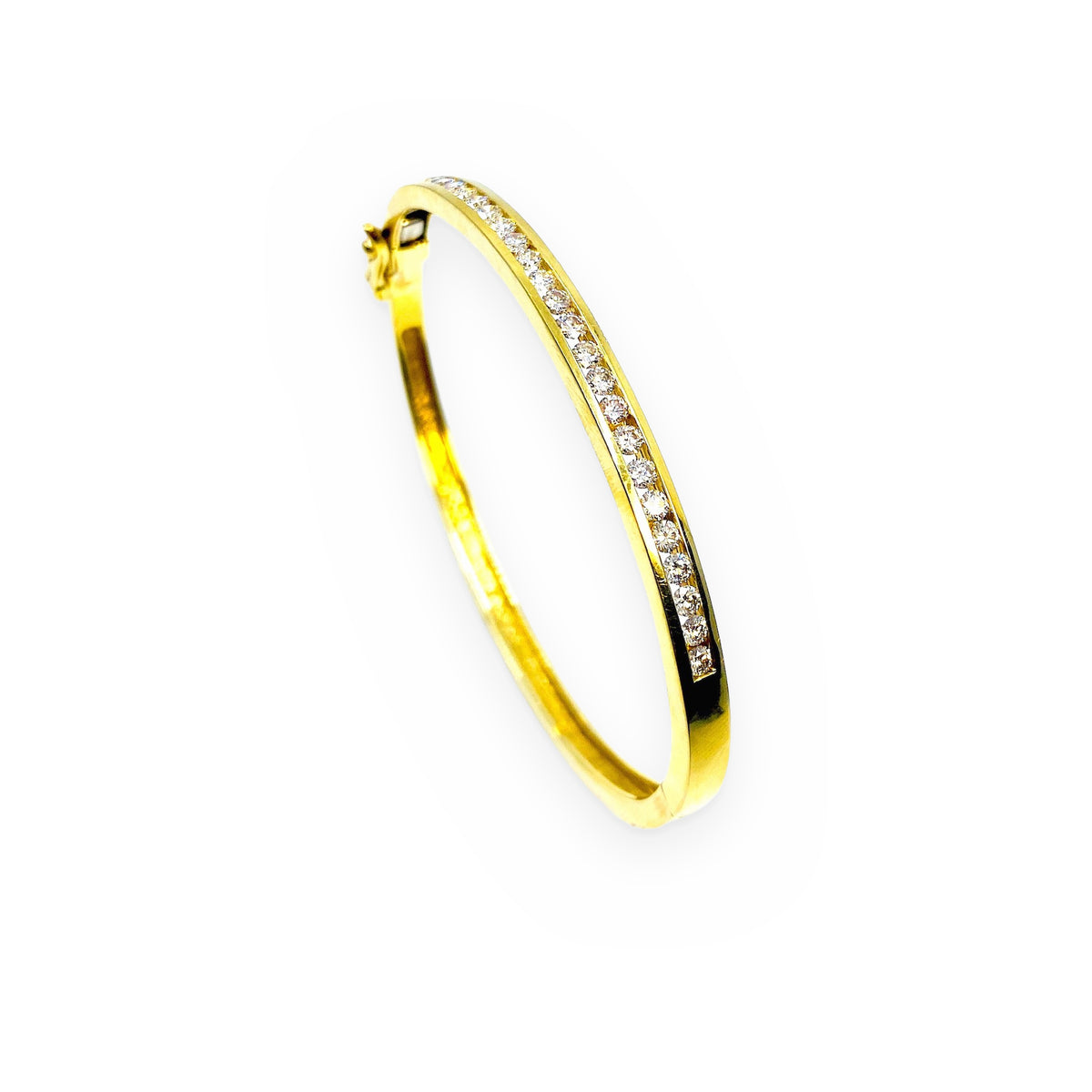 Yellow gold channel-set diamond bangle shown vertically at an angle