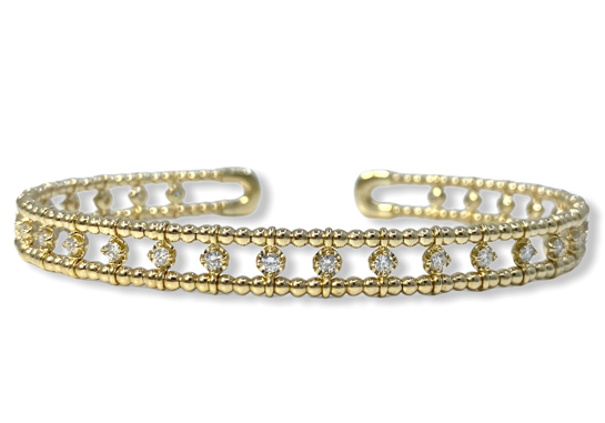 Yellow gold beaded cuff bracelet with a row of bezel-set round diamonds