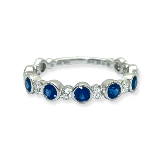 White gold band with bezel-set round blue sapphires and round diamonds