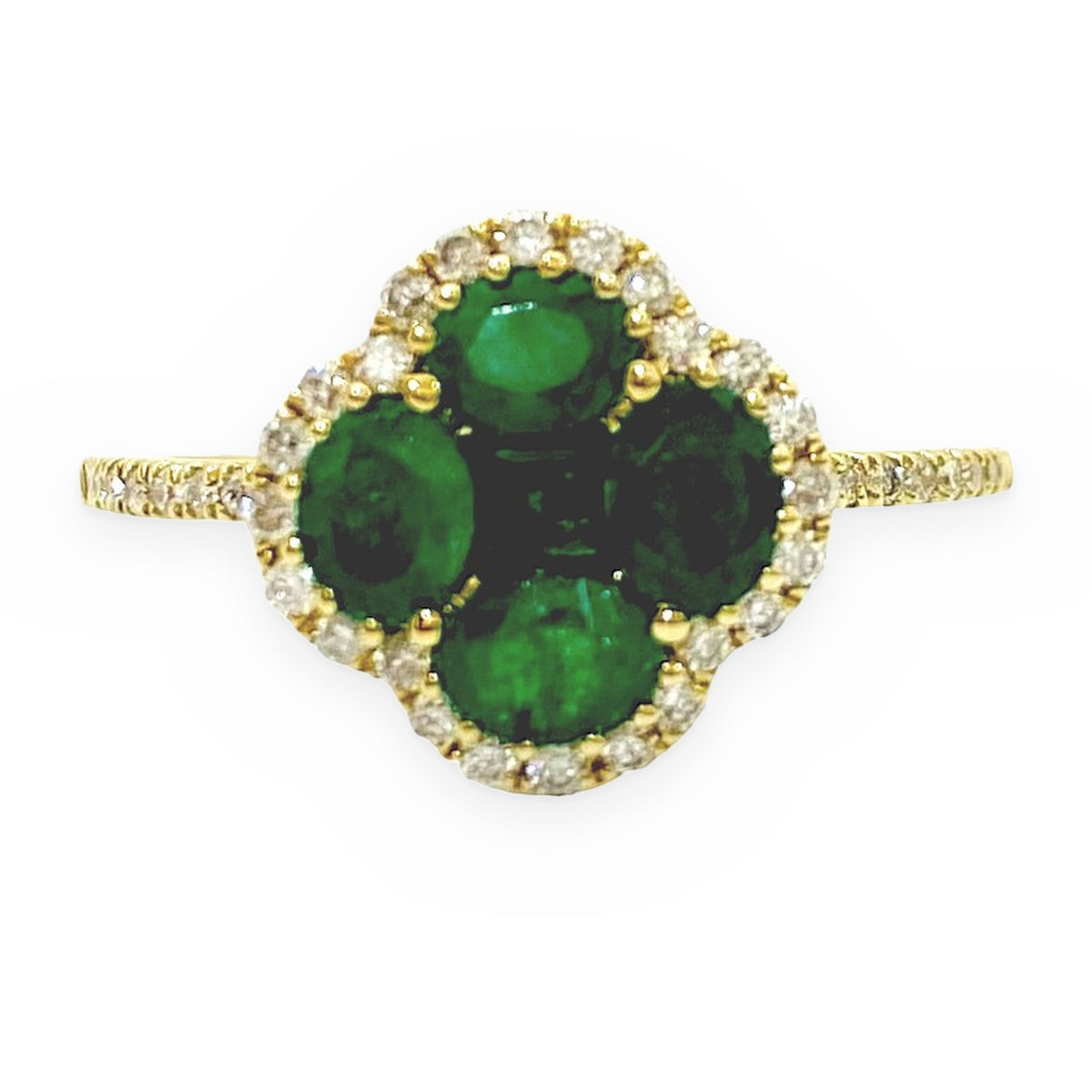 Yellow gold emerald clover ring with diamond halo, front view