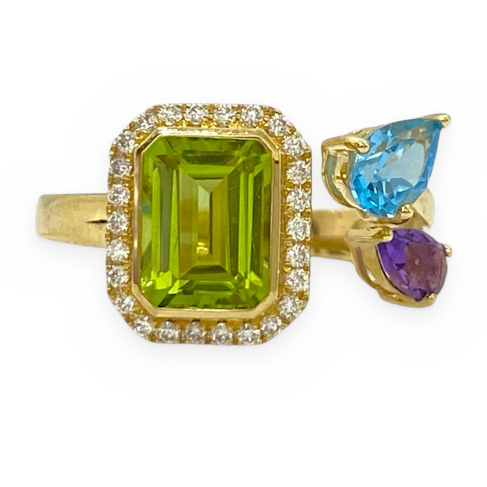 Yellow gold ring with emerald-cut peridot in a diamond halo and topaz and amethyst accents