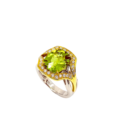Two-tone gold cushion peridot diamond halo ring, angled view