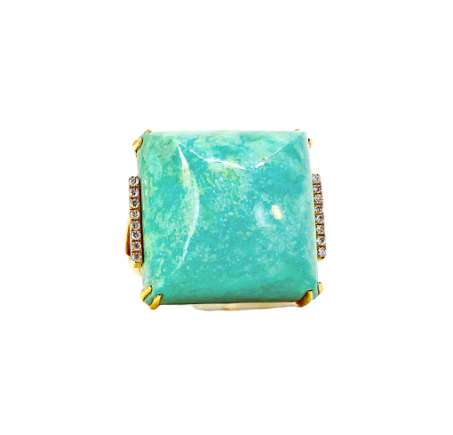 Yellow gold ring with large sugarloaf turquoise cabochon and diamond accents