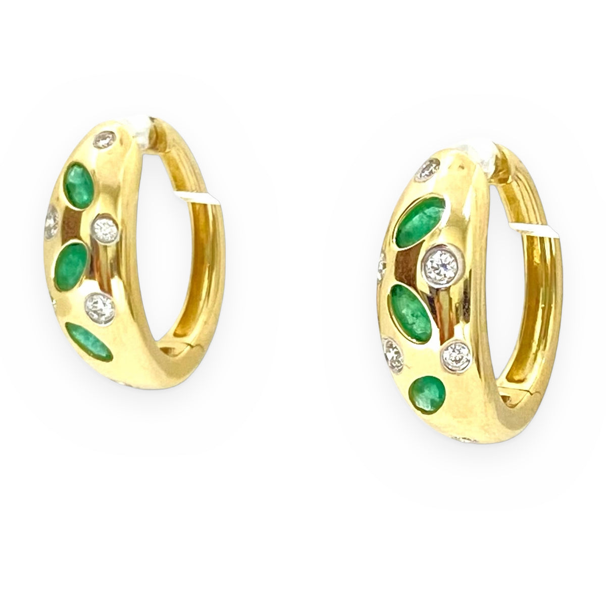 Yellow gold huggie hoop earrings flush-set with emeralds and diamonds