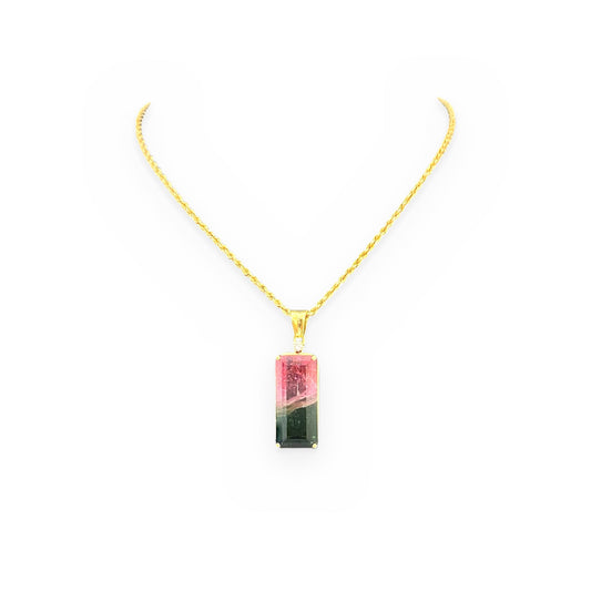 Yellow gold emerald-cut bi-color watermelon tourmaline pendant on a rope chain