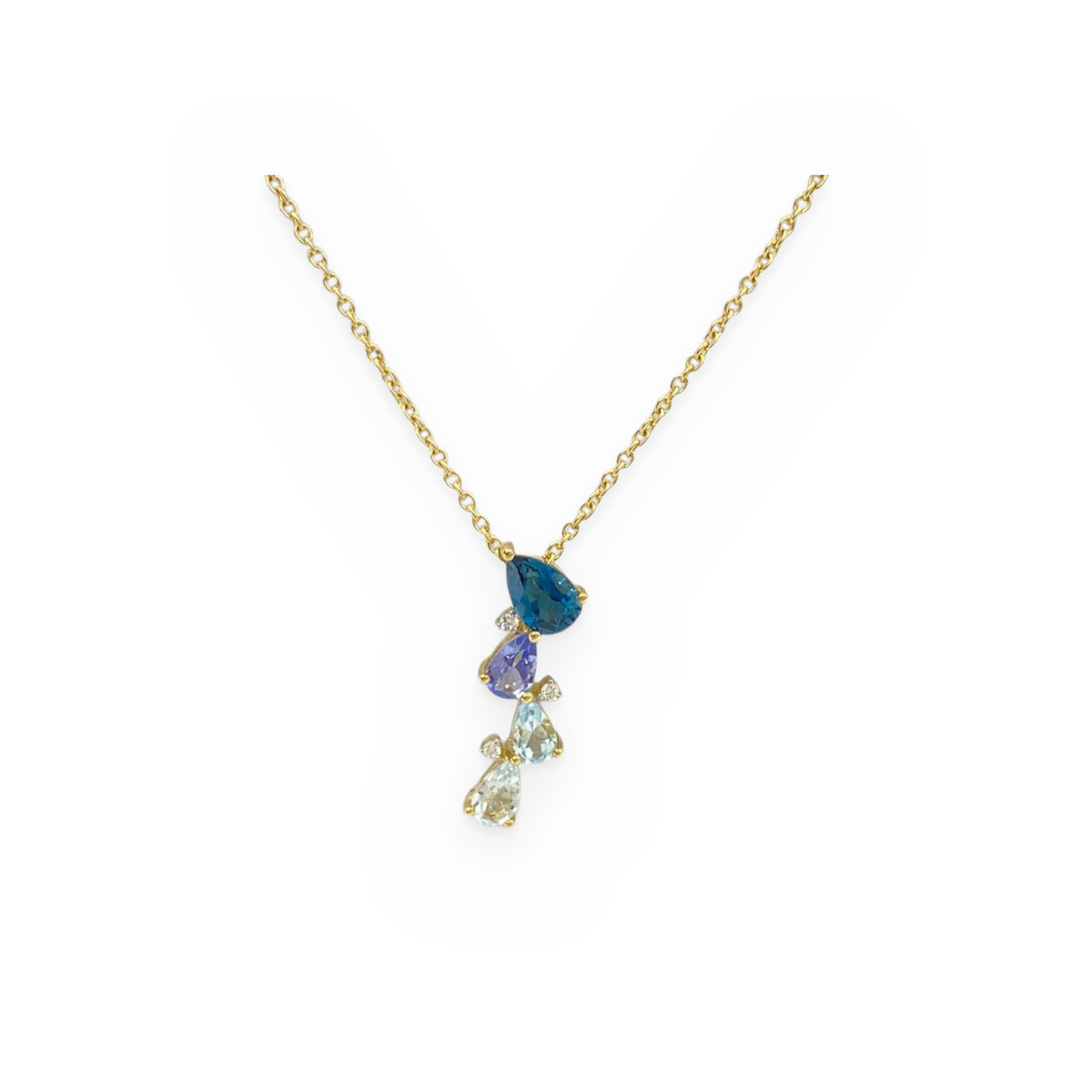 Yellow gold cascade pendant of graduated blue and green pear-shaped gemstones with diamond accents