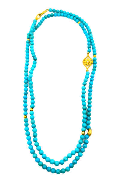 Long turquoise bead necklace doubled into two loops with a gold flower station clasp