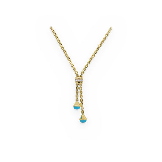 Yellow gold cable-link lariat necklace with a diamond bar and turquoise cabochon cone drops