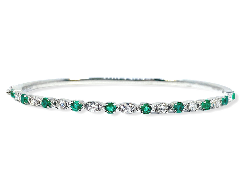 White gold bangle bracelet alternating round emeralds and diamonds with marquise-shaped links