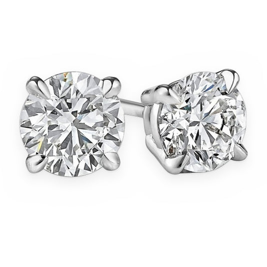 Round brilliant diamond stud earrings in four-prong white gold settings