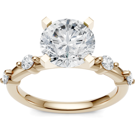 14K yellow gold round diamond engagement ring with spaced shared-prong accent band, top view