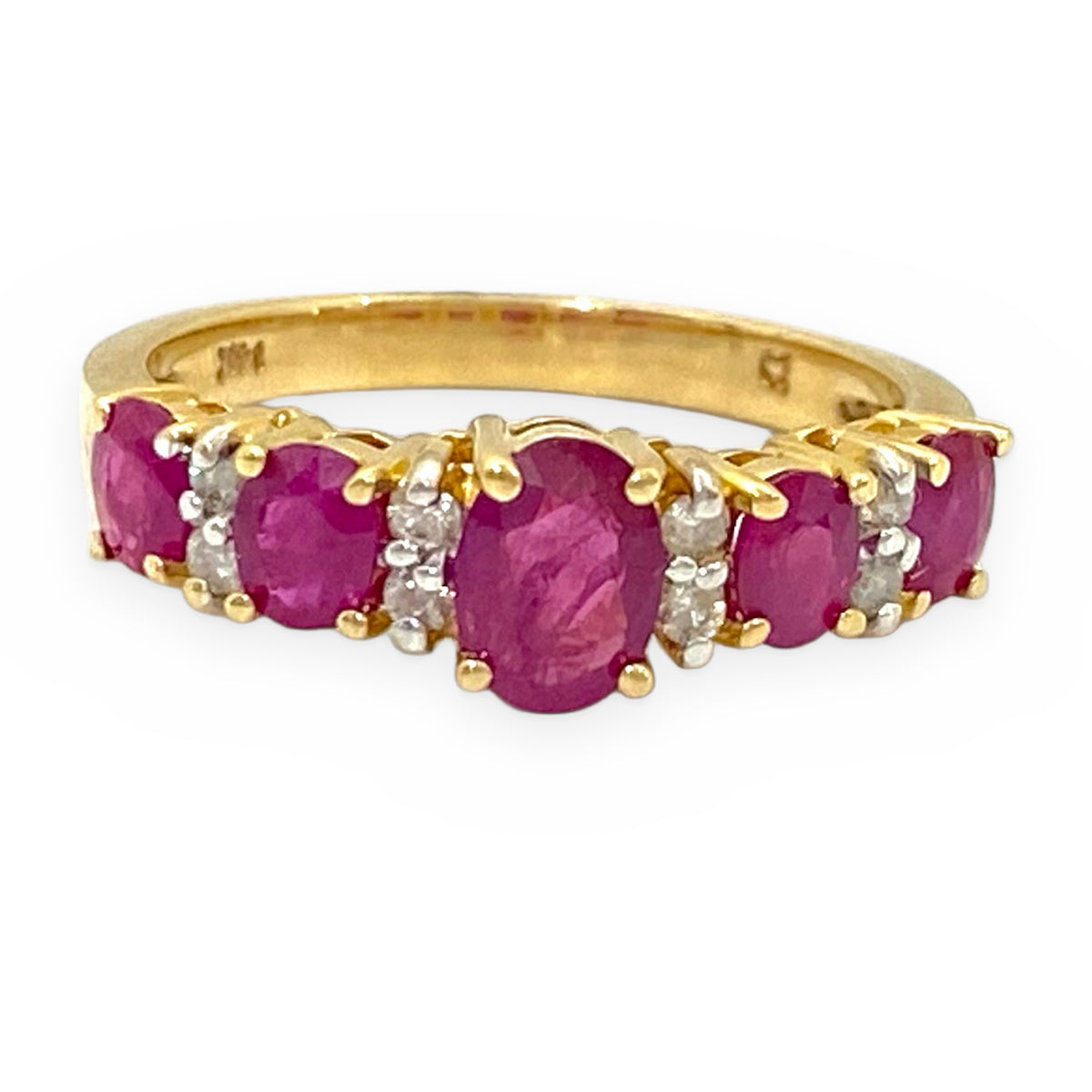Yellow gold five-stone oval ruby band with diamond accents