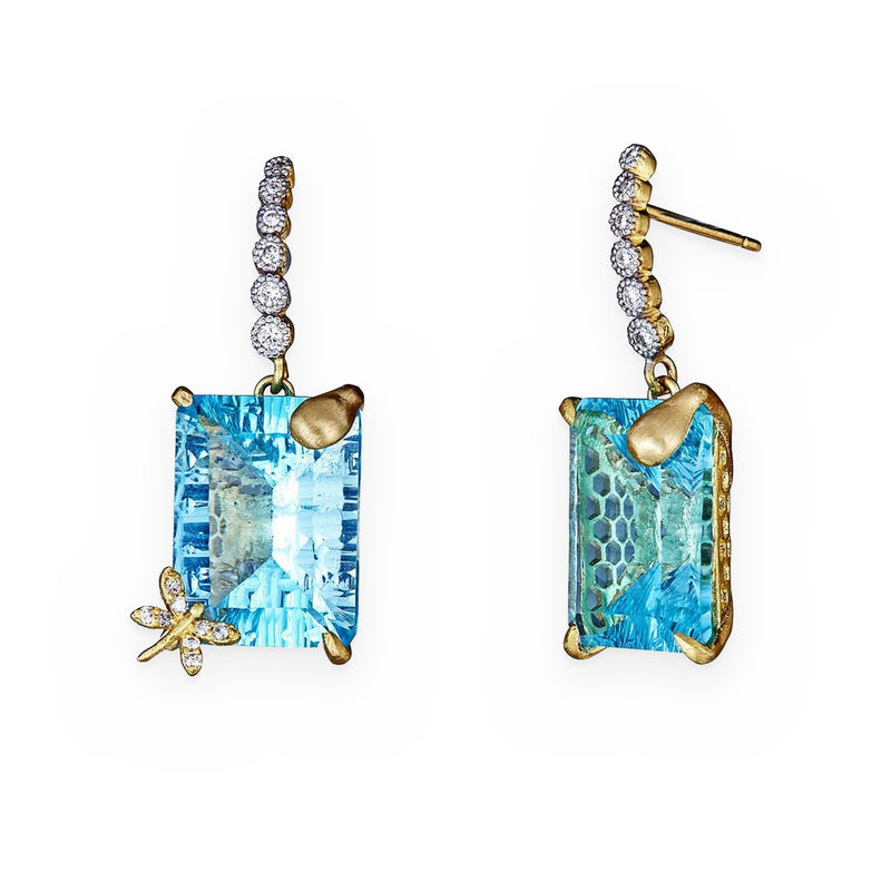 Yellow gold drop earrings with emerald-cut blue topaz and diamond dragonfly accent