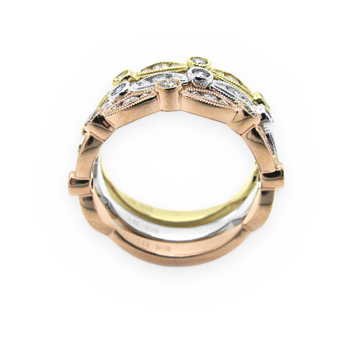 Tri-color gold triple-row diamond band standing upright
