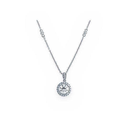 White gold round diamond halo pendant on a diamond-station chain