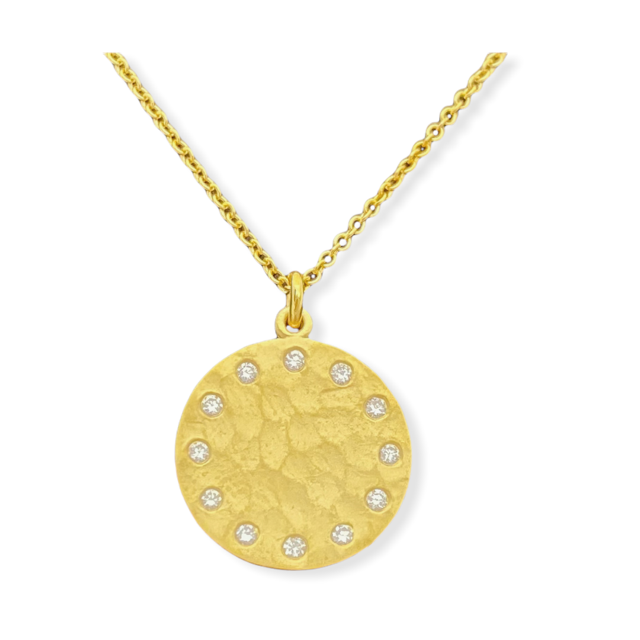 Hammered yellow gold round disc pendant rimmed with bezel-set diamonds on a gold cable chain