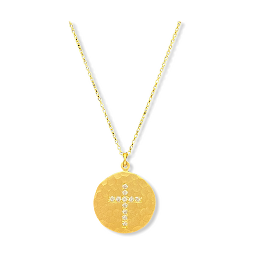 Hammered yellow gold round disc pendant with diamond cross motif on a gold chain