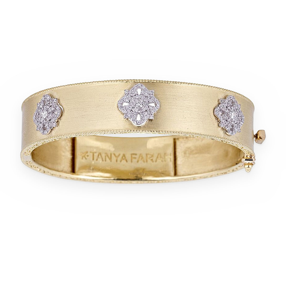 Tanya Farah yellow gold hinged bangle with three diamond pave clover stations